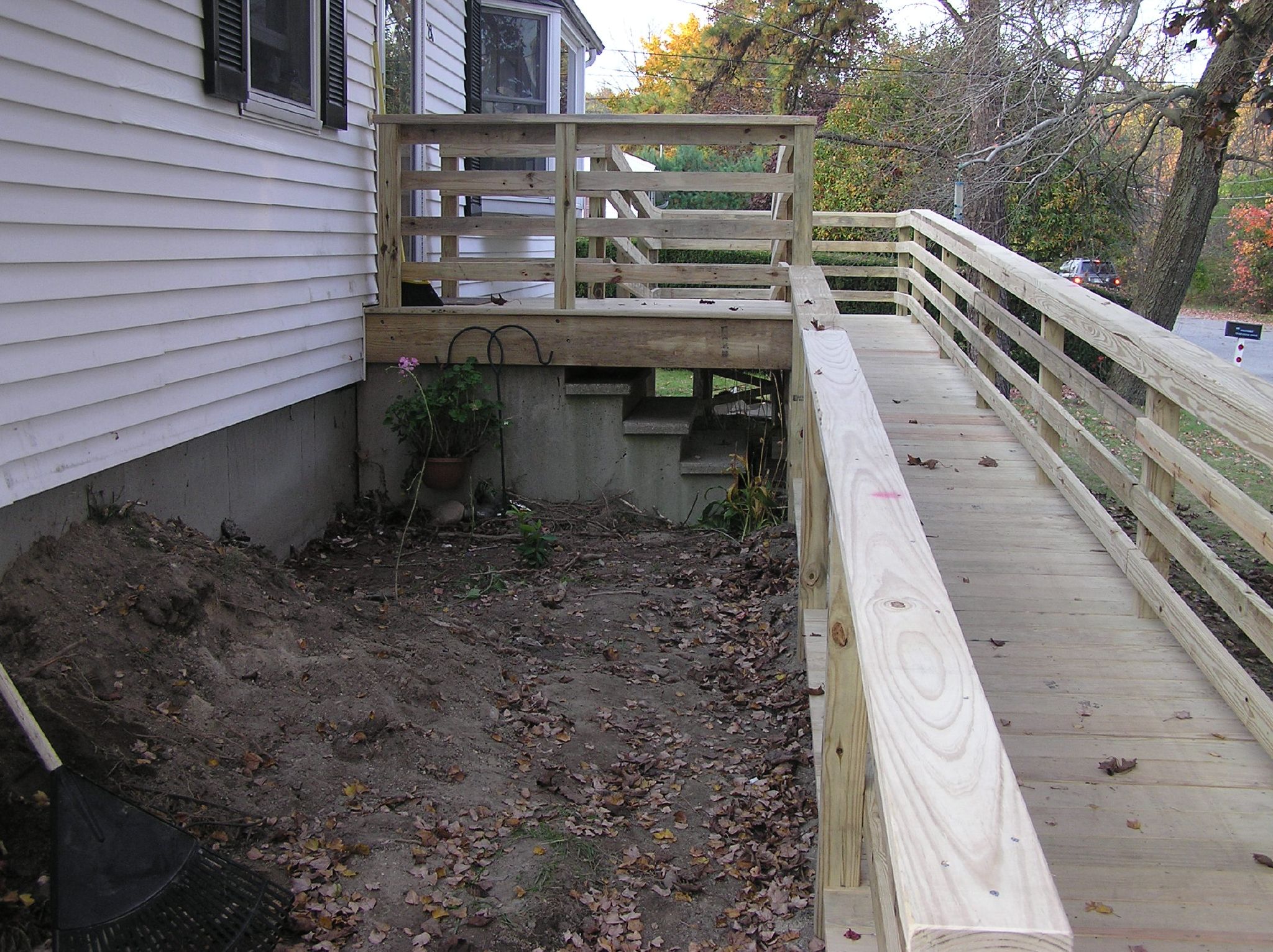 wood wheelchair ramp over front steps