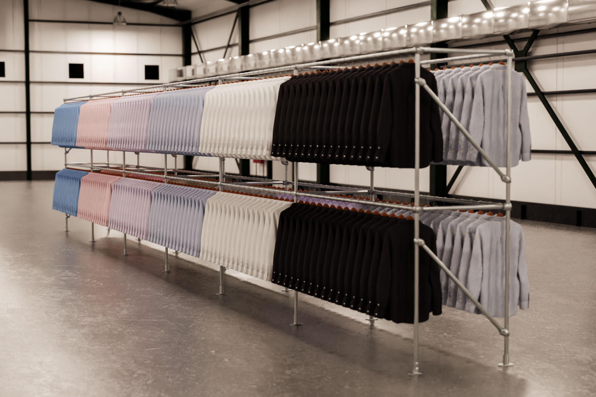 row of industrial clothing racks in warehouse