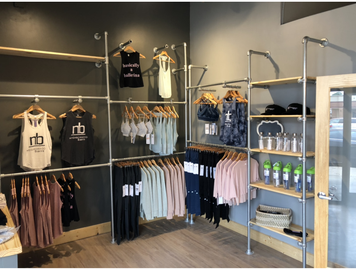 industrial clothing racks with shelves