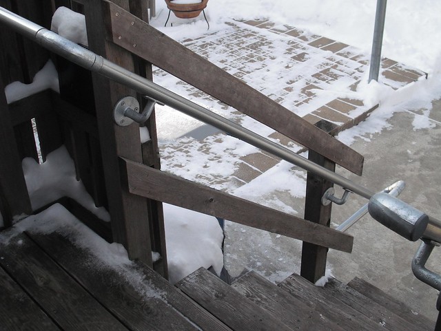Wooden Steps with New Metal Handrail