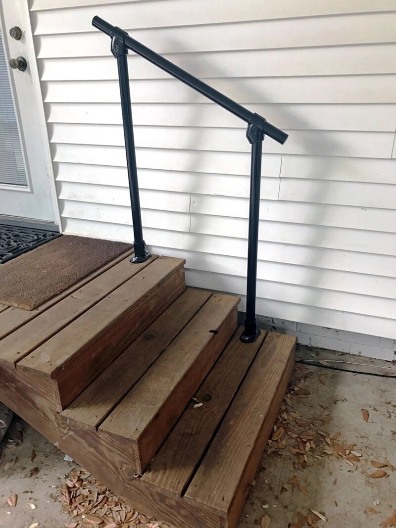 small wood steps with metal railing