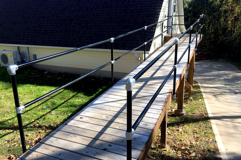 long wooden ramp with railing