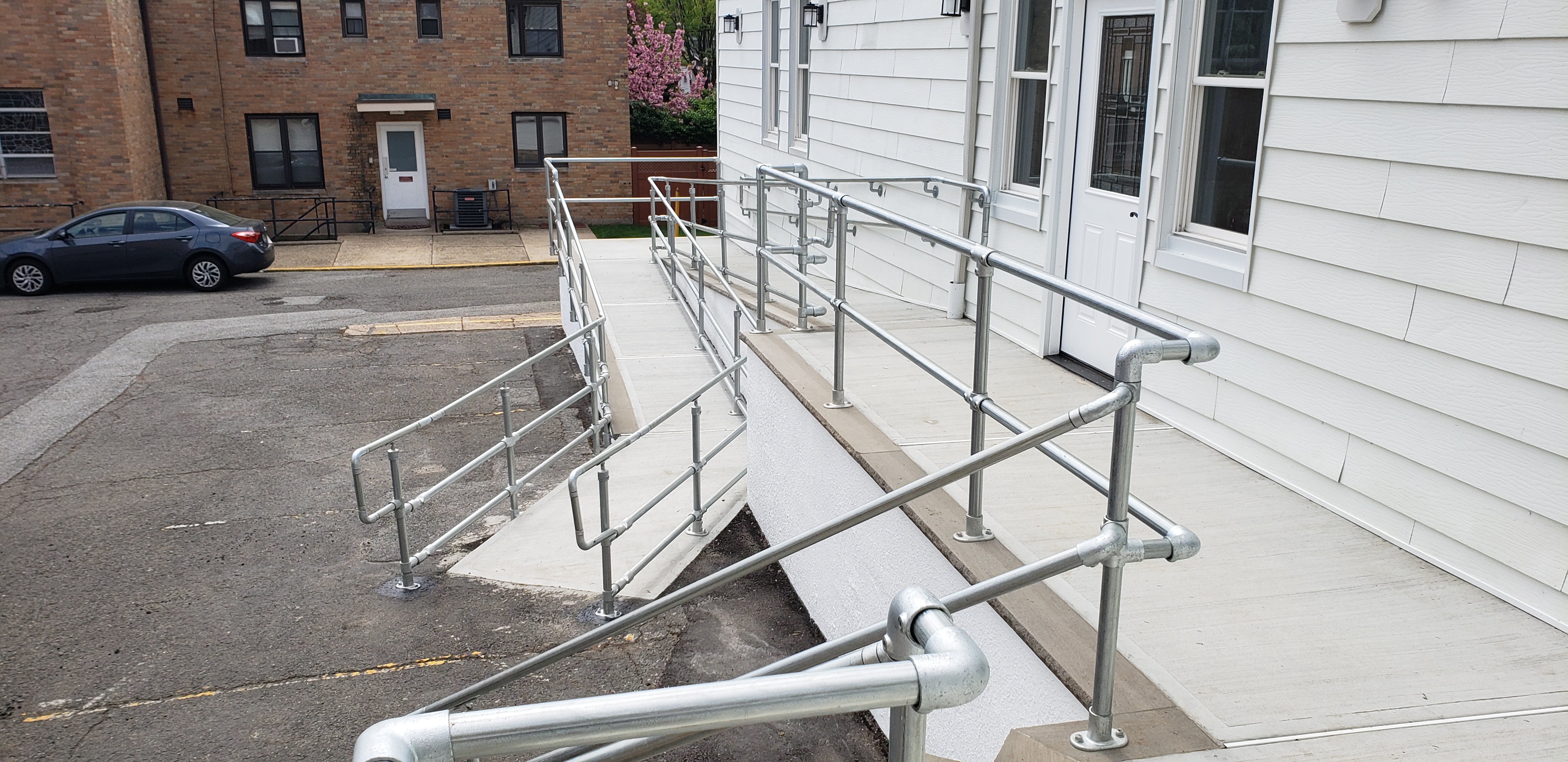 ada railing on a large wooden ramp