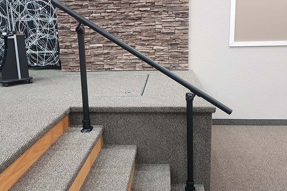 Handrail for stage stairs