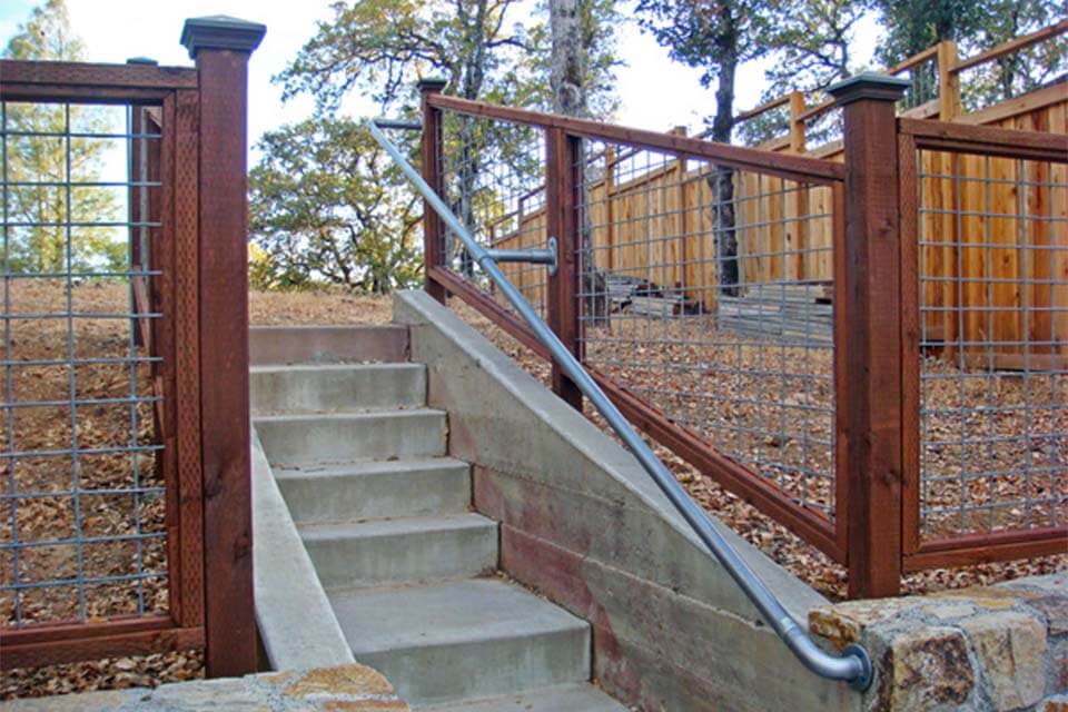 Concrete wall stair railing