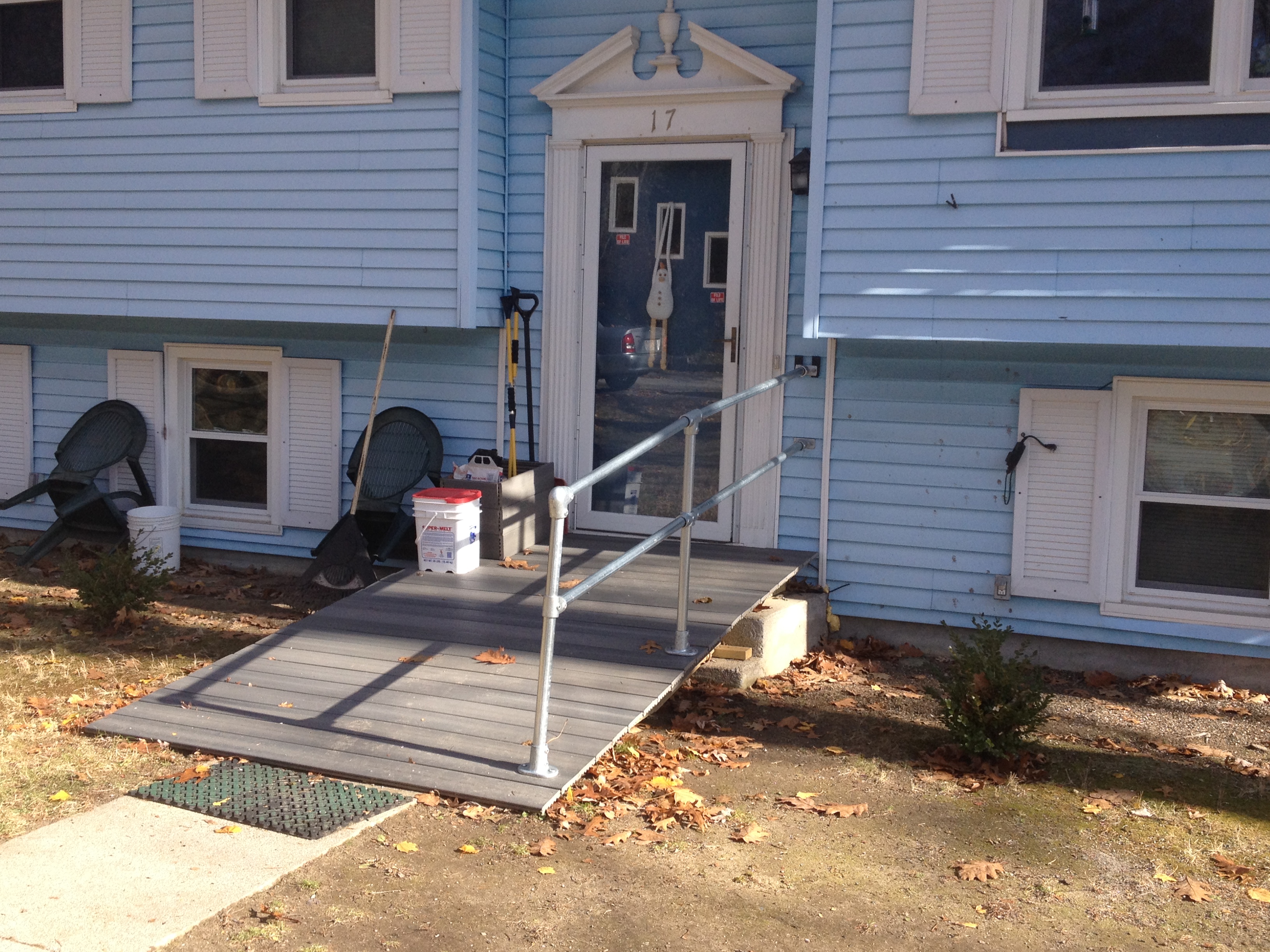 front steps with wood ramp and railing