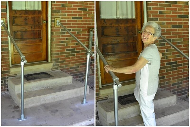 elderly woman with two handrails on front steps