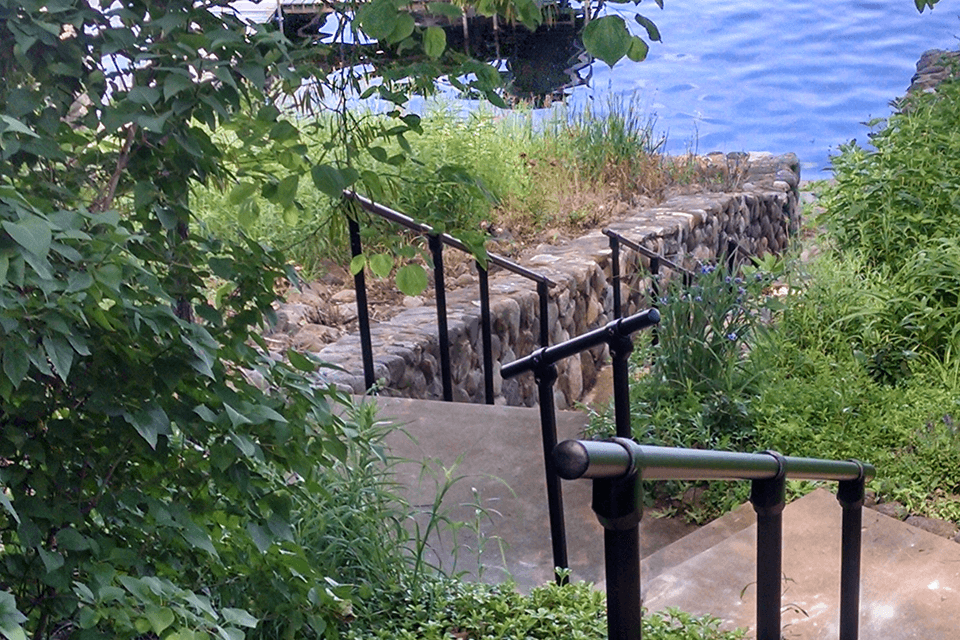 Long Staircase to Lake with Handrail